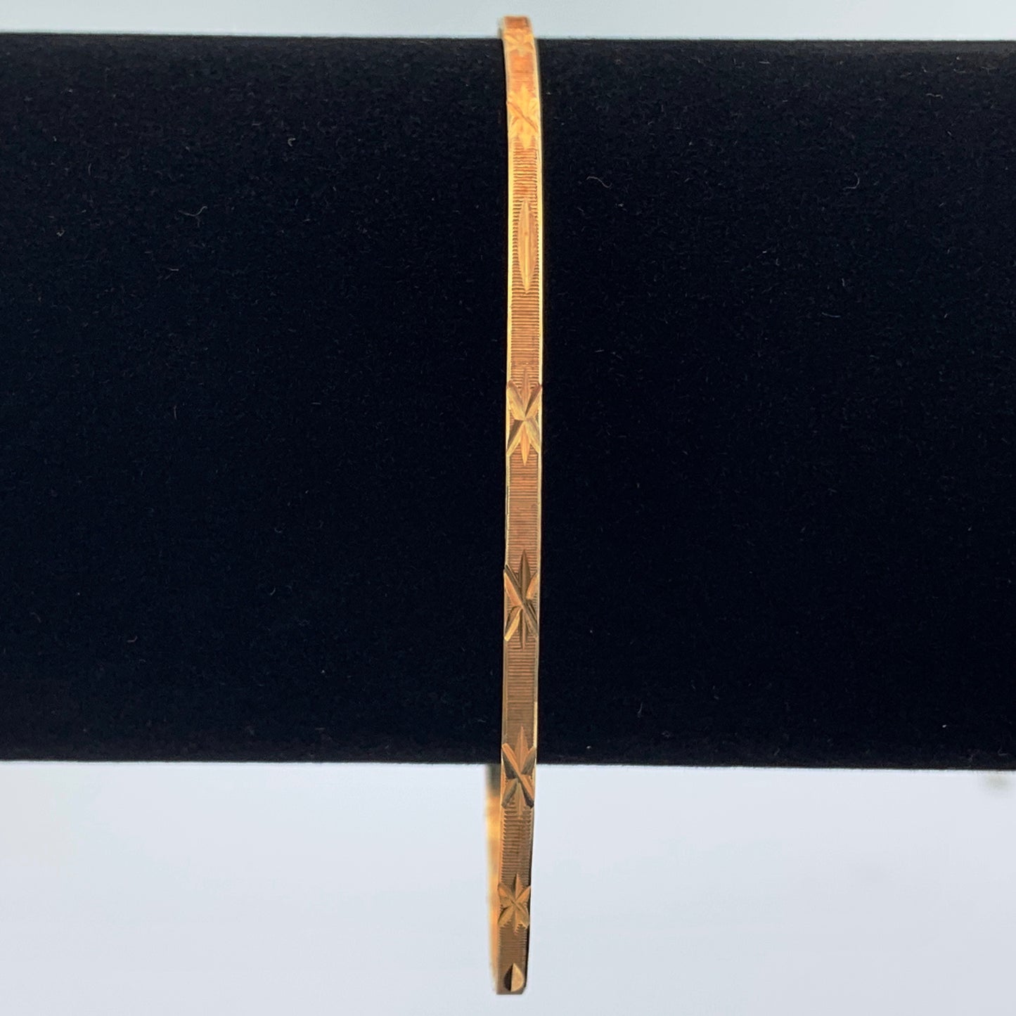 10K Yellow Gold 2mm Bangle Bracelet with Star Design